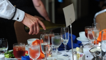 M&F Bank Annual Mtg Celebratory Waiter Pour Glass