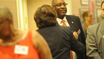 M&F Bank Annual Mtg Jim Greeting Guests 6 2015